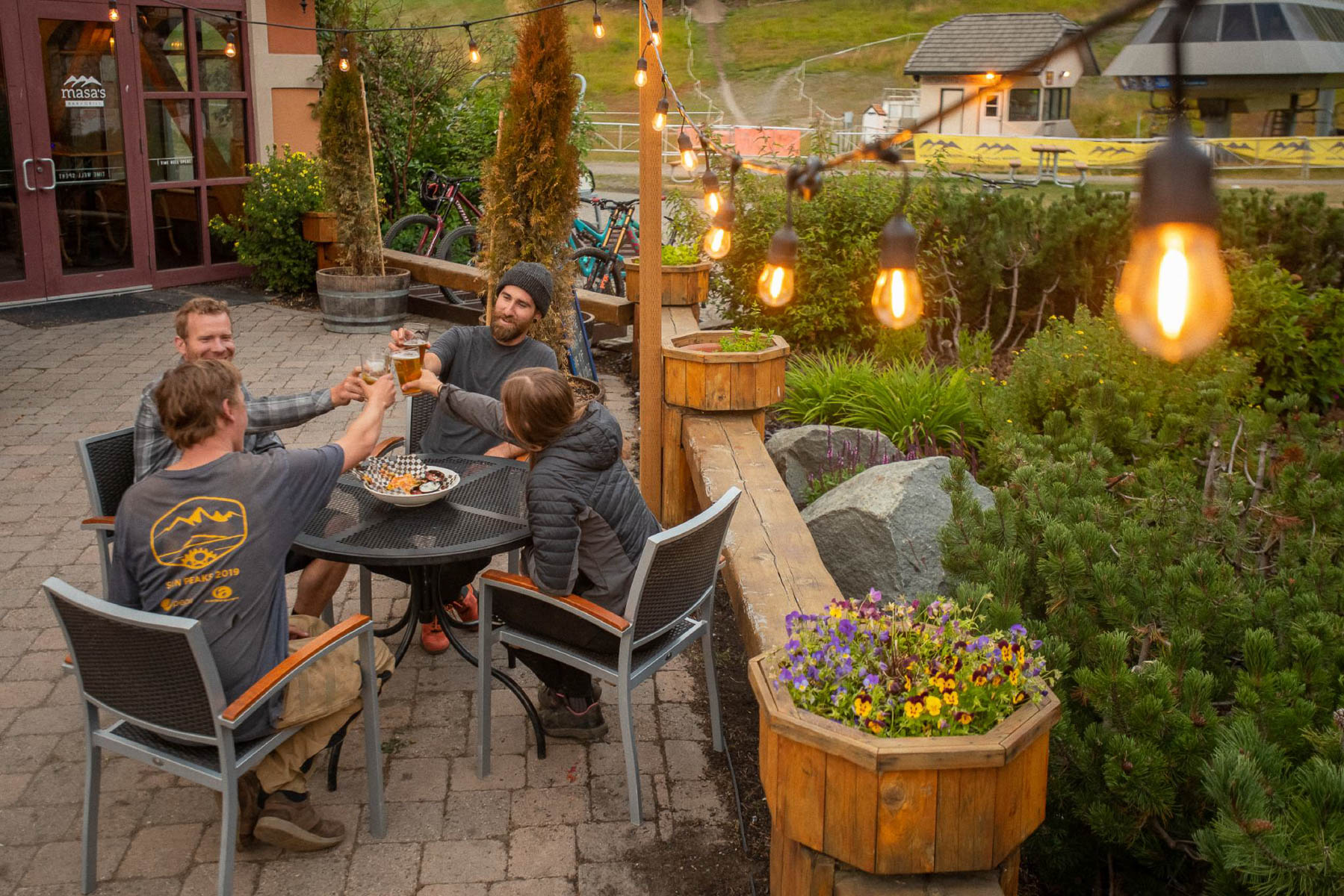 friends cheering in sun peaks