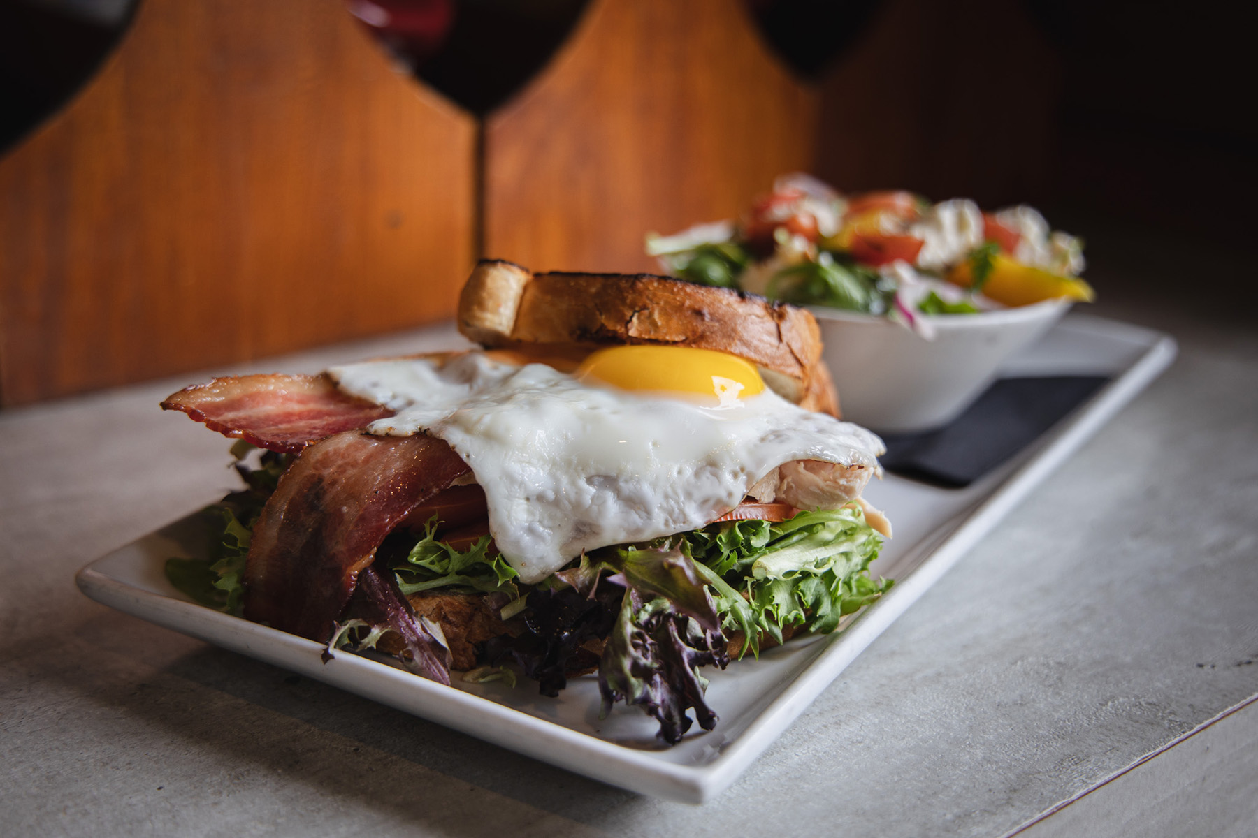 Brunch special bacon and eggs with salad at cahilty creek