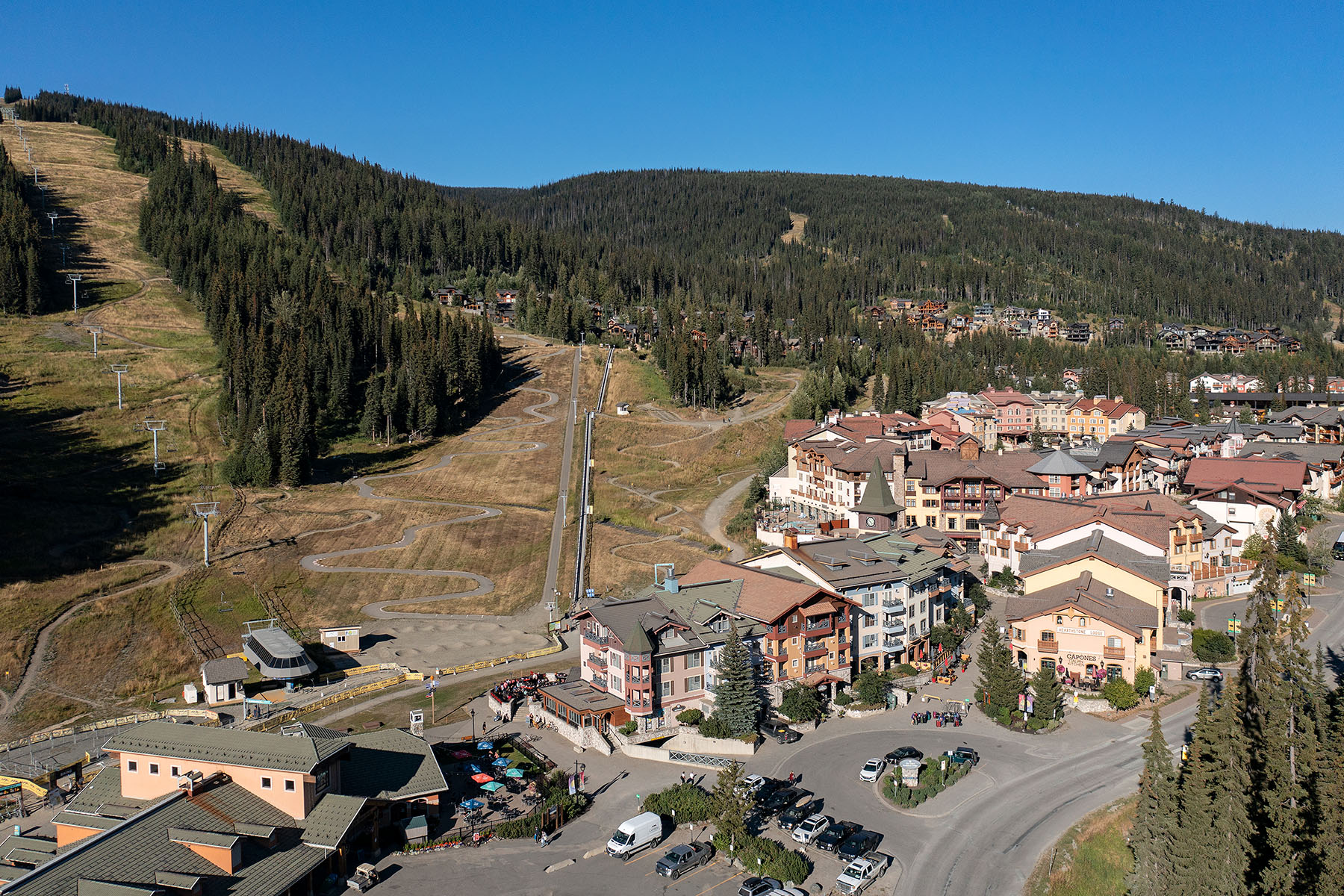 sun peaks village aerial view with mountain background